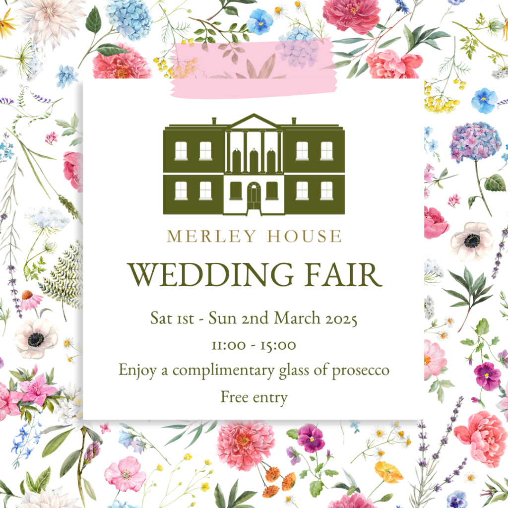 The image is advertising a wedding fair at Merley House. It features a floral border with various colorful flowers surrounding the central text. In the middle, there is an illustration of Merley House, in a dark green color. Below the illustration, the text reads: "MERLEY HOUSE WEDDING FAIR Sat 1st - Sun 2nd March 2025 11:00 - 15:00 Enjoy a complimentary glass of prosecco Free entry" The background of the text area is white, and the text is in a green and gold color scheme.